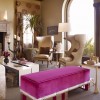 Pink bench standing out within a room with neutral-colored furnishings