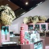 Beautiful and delicate flowers used as décor in the beauty section of a luxury boutique